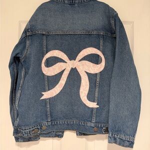 Old Navy girls size 14-16 Jean jacket with pink bow appliqué detail on back